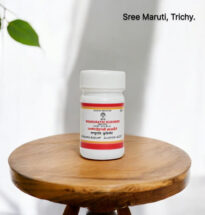 Mandurathi Kudineer in a herbal cup with powdered chooranam – used in Siddha medicine for anemia and detoxification.