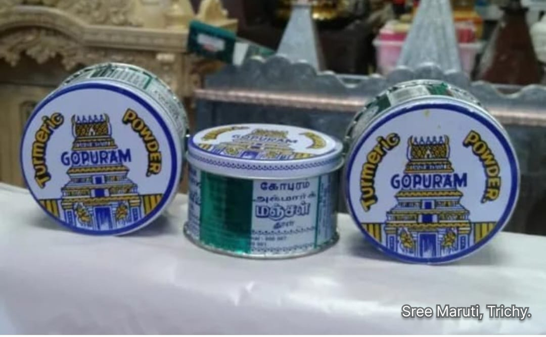 Packet of Gopuram Turmeric Powder with turmeric roots and ground powder.