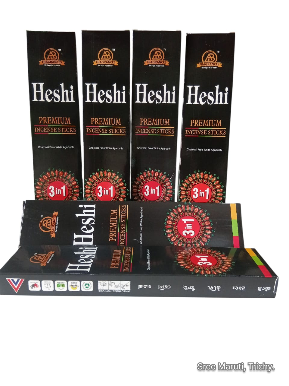 Heshi Premium Incense Sticks 3-in-1 pack with burning incense.