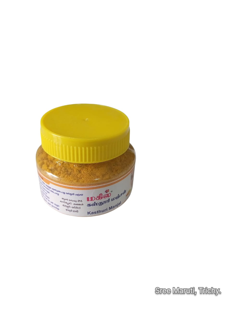 Mahil Kasthuri Manjal box with wild turmeric roots and powder.