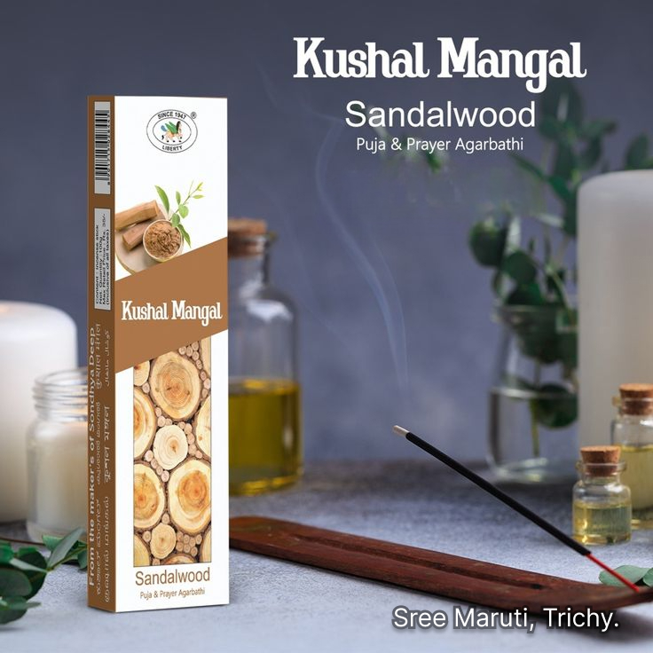 Kushal Mangal Sandalwood Incense Sticks pack with burning incense and sandalwood pieces.