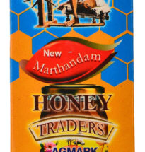 New Marthandam Honey jar with honey dipper and honeycomb.