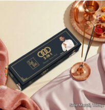 Zed Black 3-in-1 incense sticks pack with burning incense in a holder.