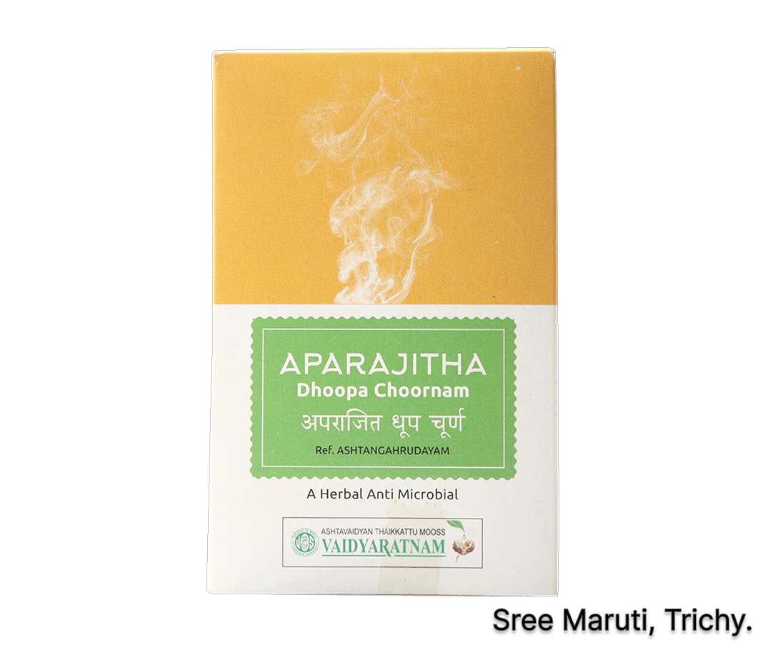 Aparajitha Dhoopa Choornam herbal fumigation powder with smoke rising.