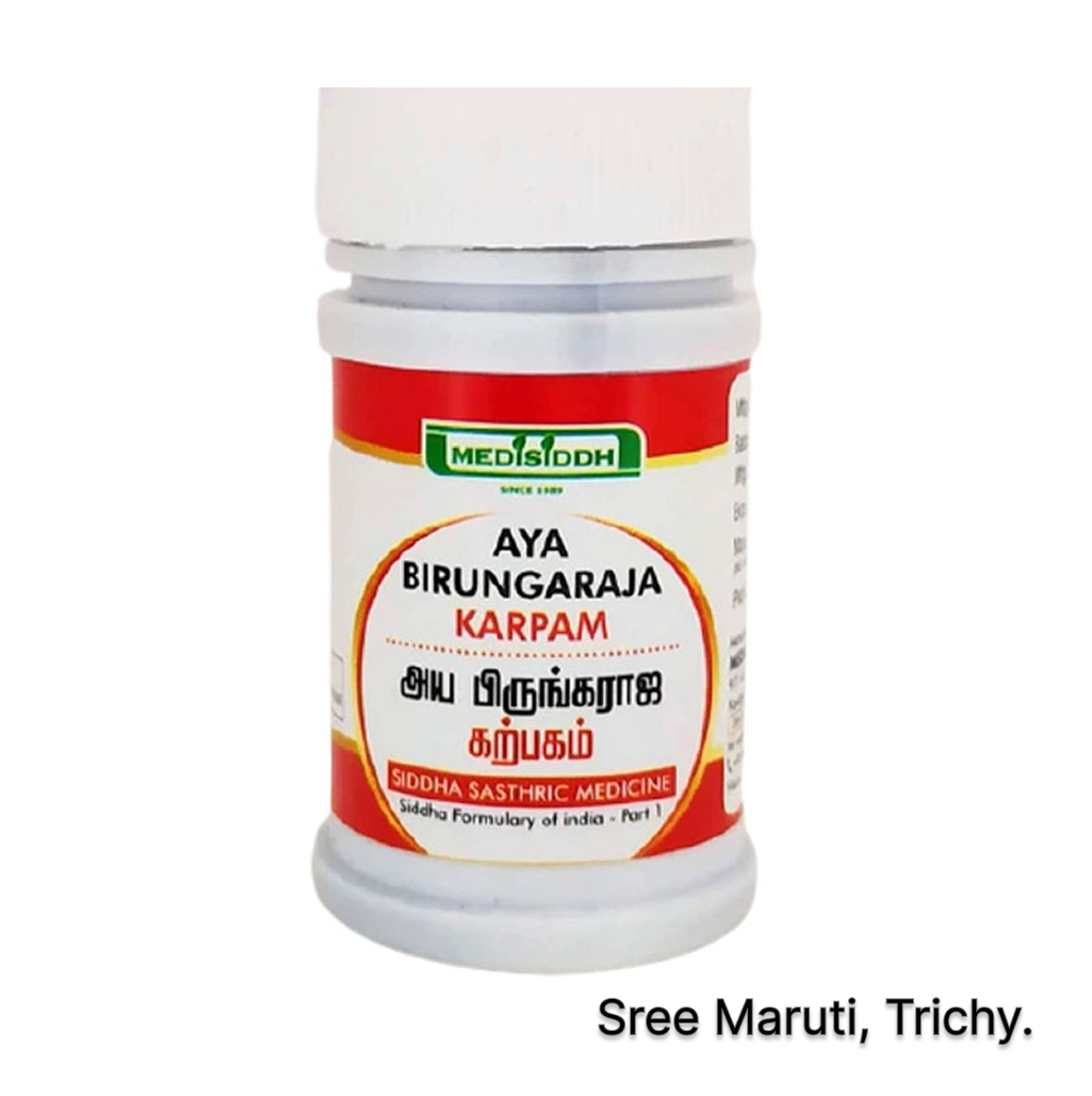 Aya Birungaraja Karpam herbal Siddha medicine with Bhringraj leaves.