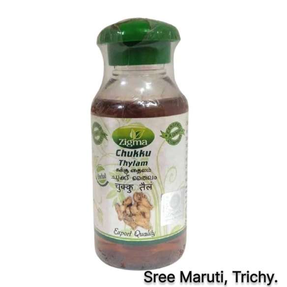 Chukku Thailam bottle with dry ginger and herbal oil for cold and pain relief