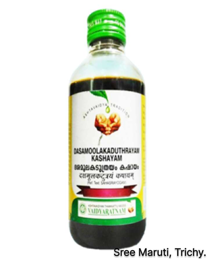 Dasamoolakaduthrayam Kashayam bottle with ginger, pepper, and herbal roots.