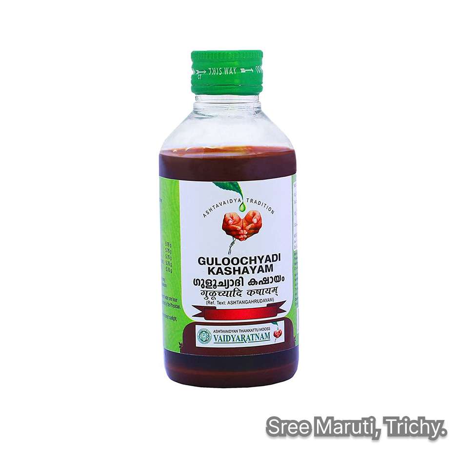 Cup of Guloochyadi Kashayam with Ayurvedic herbs, used for digestive health, detoxification, and immunity.