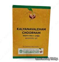 Kalyanavaleham Choornam powder with honey, ghee, and herbs.