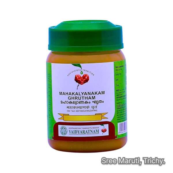 Mahakalyanakam Ghrutham in a brass bowl with Ayurvedic herbs – natural tonic for memory, fertility, and nervous health.