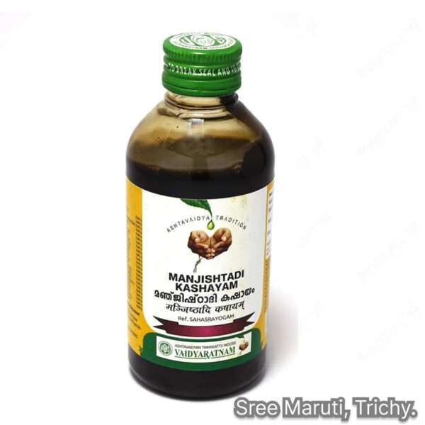Bottle of Manjishtadi Kashayam with Manjishta roots and herbal powders.