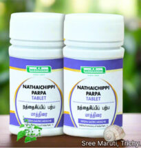 Nathaichippi Parpam Siddha medicine with conch shells and powdered ash.