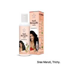 Neelibhringadhi Thailam bottle with herbal hair care ingredients