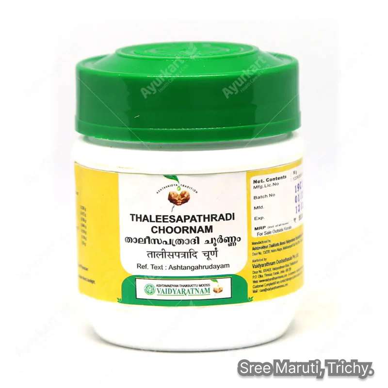 Thaleesapathradi Choornam powder with honey, pepper, and cardamom.