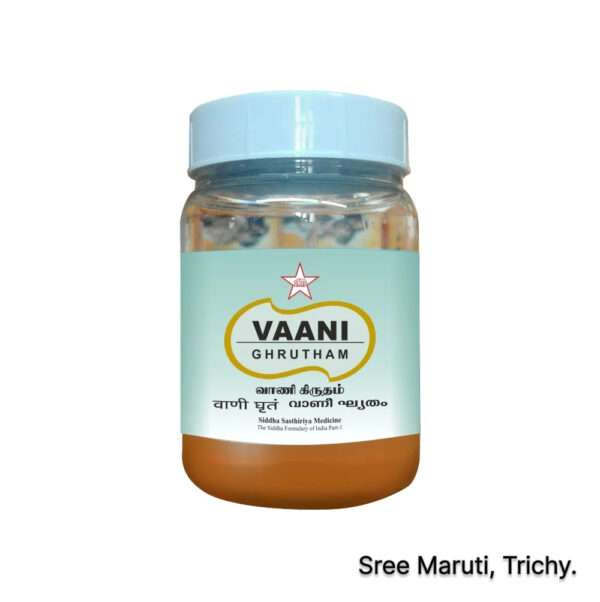 Vani Ghrutham in a brass bowl with herbs for memory and nervous system health