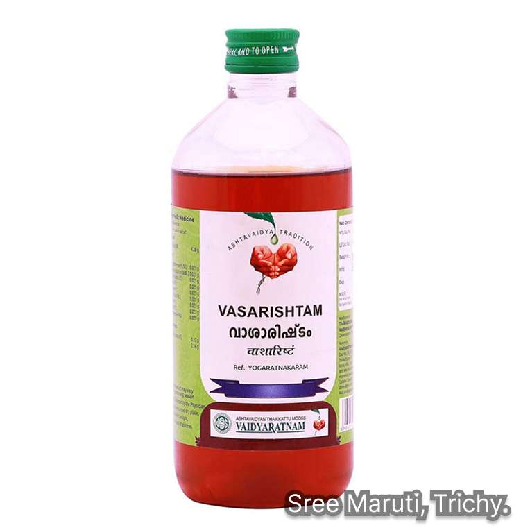 Vasarishtam bottle and Vasa leaves – Ayurvedic remedy for cough, asthma, and bronchitis.