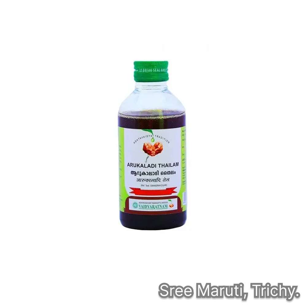 Bottle of Arukaladi Thailam Ayurvedic oil with herbs for pain relief, arthritis, and neurological support.