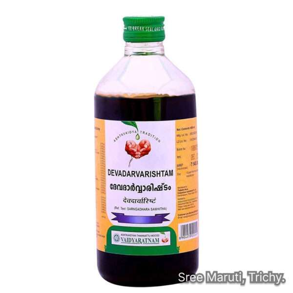 Bottle of Devadarvarishtam Ayurvedic tonic with cedarwood and herbs for skin and urinary health.
