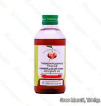 Thengin Pushpadi Thailam Ayurvedic coconut oil with floral extracts for hair care and stress relief.