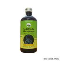 Bottle of Adathodai Manappagu syrup with Adathodai leaves used for cough and respiratory health