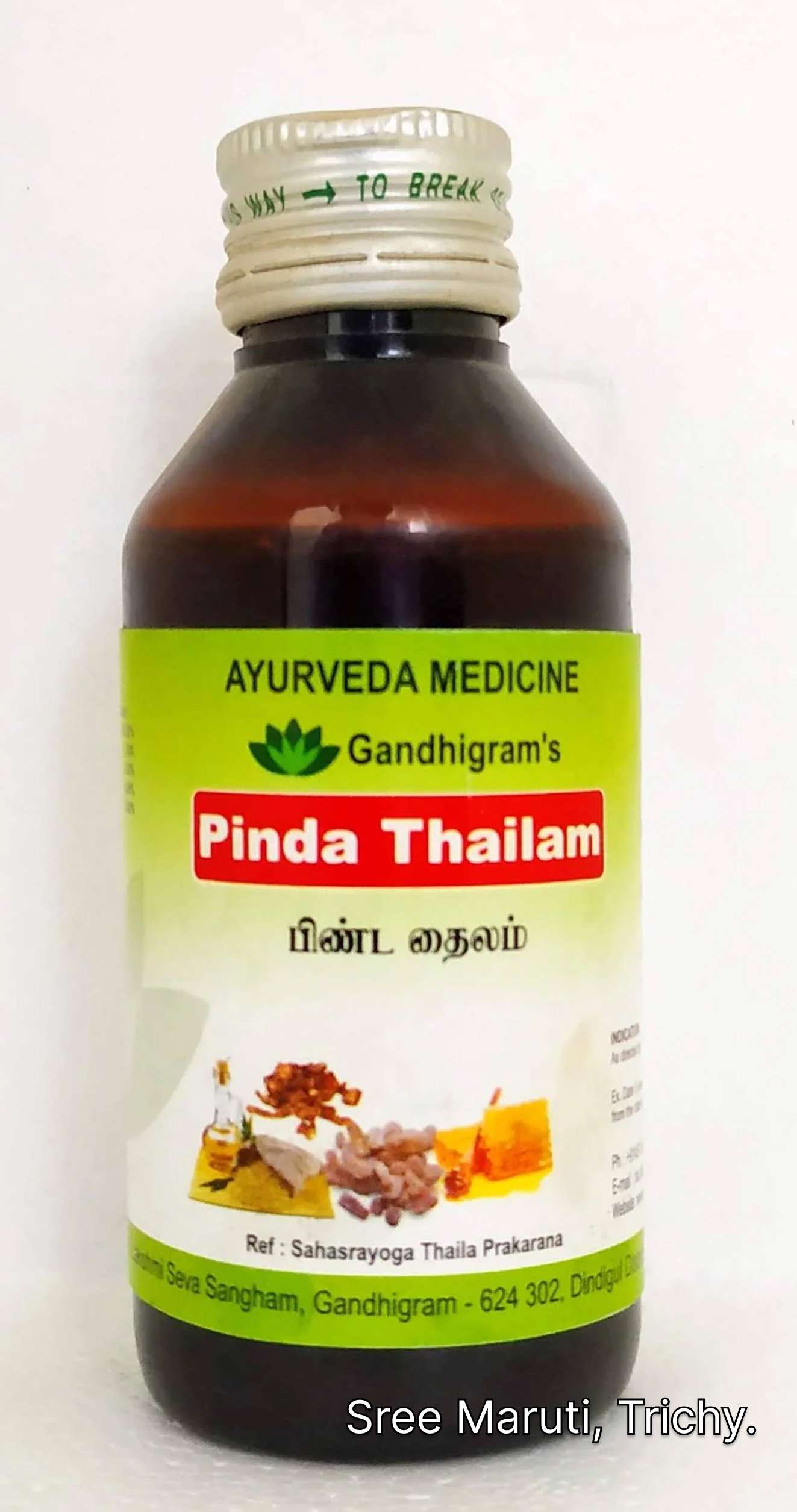 Pinda Thailam Ayurvedic oil bottle with herbal ingredients used for cooling and anti-inflammatory relief