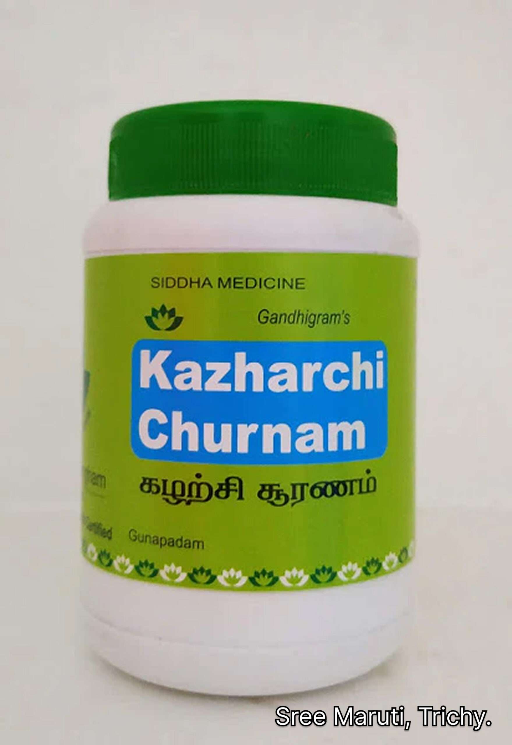 Kalarchi Churanam herbal powder displayed with natural herbs.
