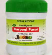 Karbogi Pasai herbal paste in a container with Siddha herbs.