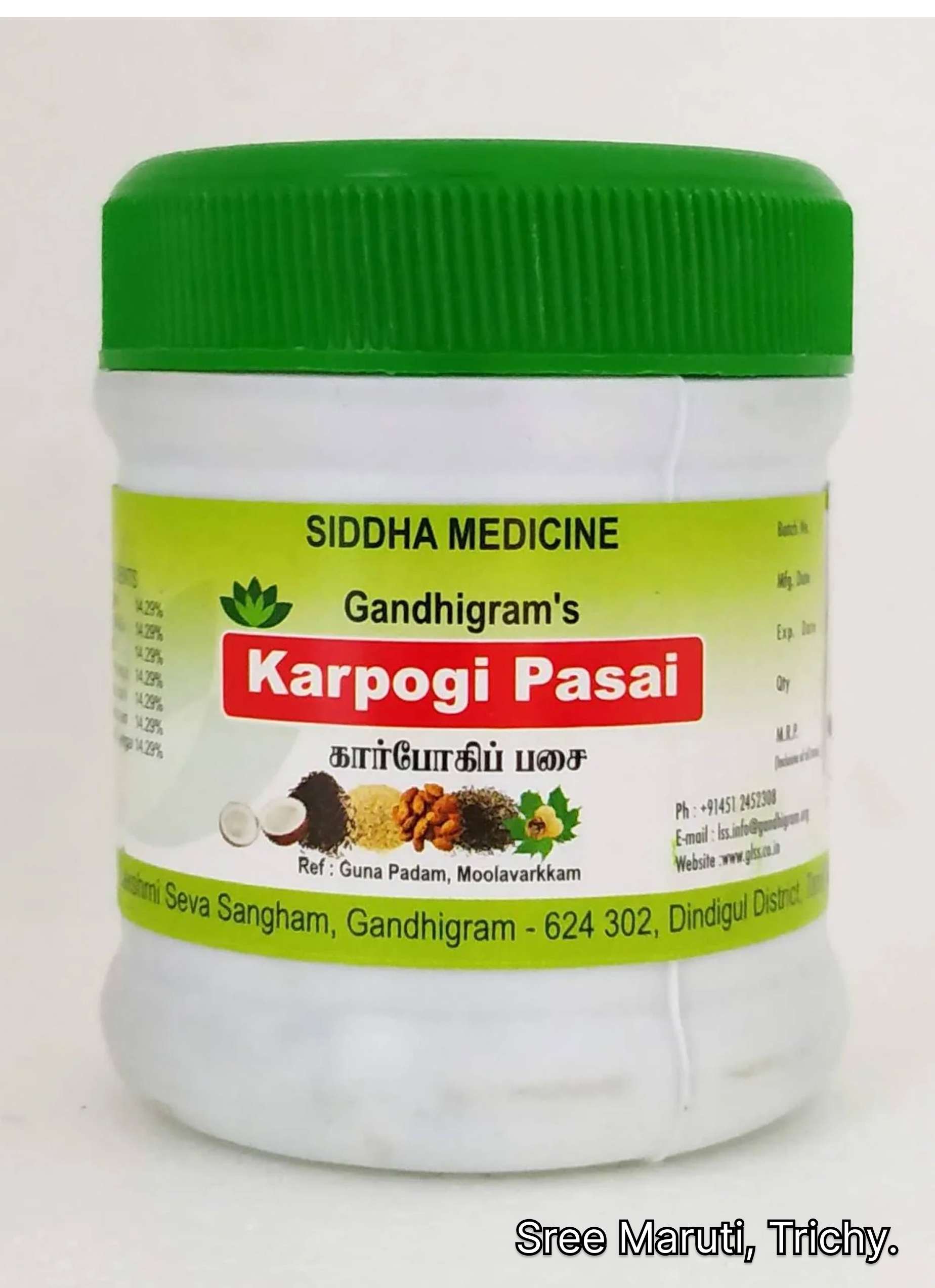 Karbogi Pasai herbal paste in a container with Siddha herbs.